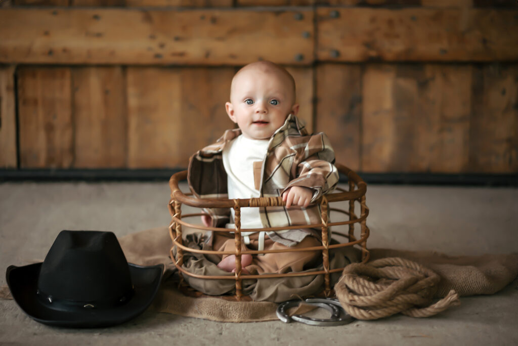 baby photoshoot with western theme cowboy