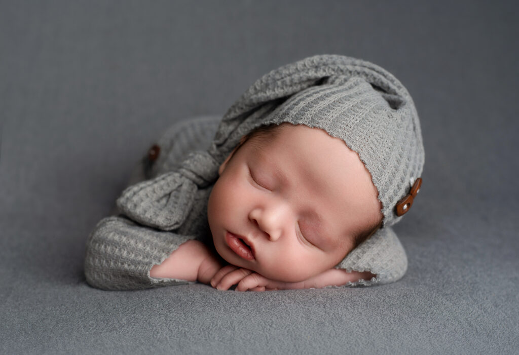 baby sleeping in a professional newborn shoot in Eagle Mountain Utah